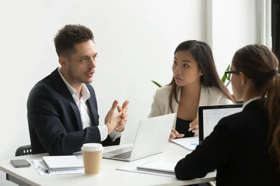 Advisers discussing a client's situation